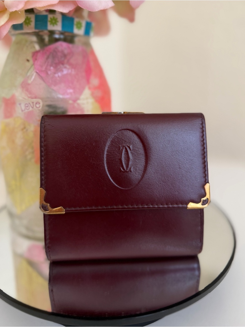 Must de Cartier bordeaux kiss-lock compact leather wallet